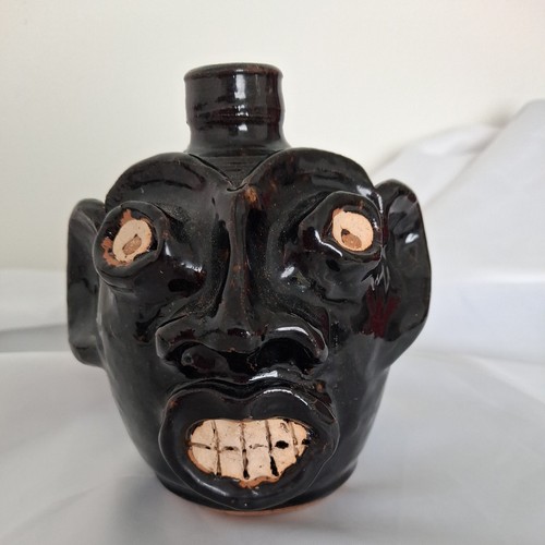 Liz ringus face - (signed, ear)